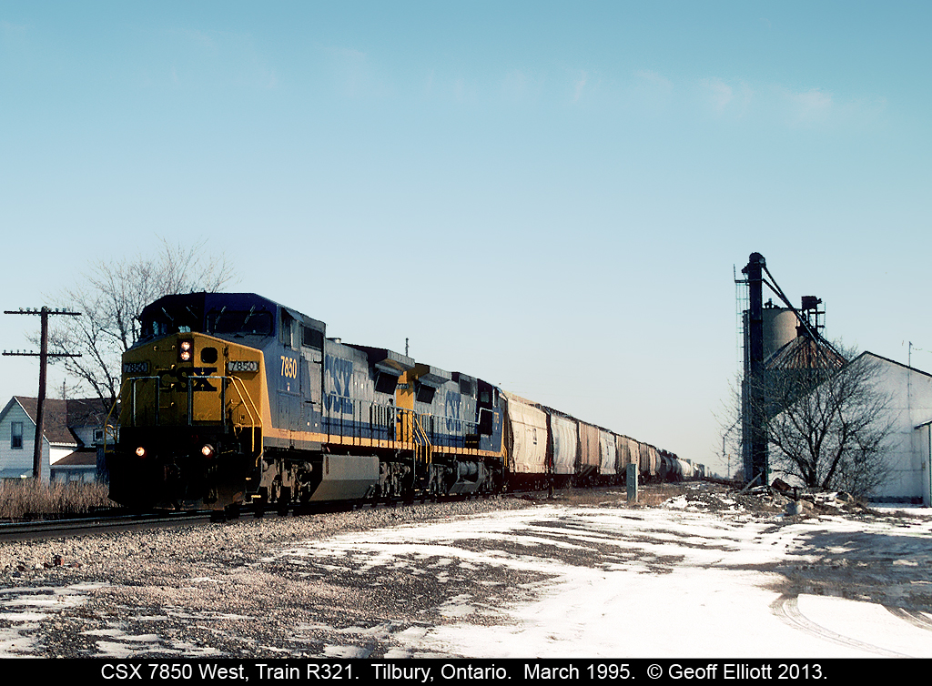 CSX 7850 West, Train R321, rolls through Tilbury, Ontario on CASO rails as it runs from Buffalo to Detroit back in 1995. This is 18 years ago and it's hard to believe that there are only two things in this picture that still exist at this location today, the white house immediately to the left, and the sky!!! No forward thinking by the railway or industry here, just simple "bottom line" mentality.