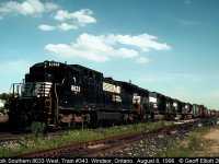 NS 8633 has train 343 well under control with it's 4 units as it rolls slowly by the Windsor South depot on the way to the U.S. via the Windsor/Detroit Rail tunnel.