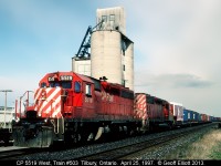 CP SD40 #5519 leads westbound train #503 into the siding in Tilbury to wait for an eastbound to pass.  I love the brand new Dr. Pepper trailer first up on the train.  Saw several of these heading west back in 1997.