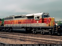 In my trips to 'the north' I was only lucky enough to shoot one ex-Algoma Central unit still in ACR paint on the road.  Here Wisconsin Central SD40-2 #6005, ex-Algoma Central #187, is on the point of what will be the southbound freight out of Hawk Junction.  The crew is getting ready to leave as their coolers, sitting on the nose of the unit, are moved into the cab.