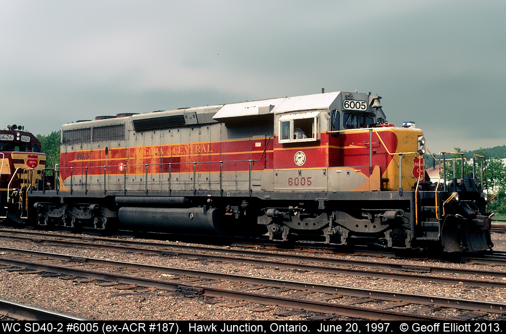 In my trips to 'the north' I was only lucky enough to shoot one ex-Algoma Central unit still in ACR paint on the road.  Here Wisconsin Central SD40-2 #6005, ex-Algoma Central #187, is on the point of what will be the southbound freight out of Hawk Junction.  The crew is getting ready to leave as their coolers, sitting on the nose of the unit, are moved into the cab.