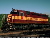 Wisconsin Central SD45 #6605 sits idle at Hawk Junction back in 1997.  This unit, along with an F45, will be lifted by the southbound freight shortly to make the trip back to Sault Ste. Marie.