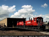 CP SW1200RSu's #1244 and 1247 go for a spin on the turntable in Windsor back in March of 1998.  Now most, if not all the SW's are gone, and sadly, the roundhouse in the picture was taken down by the "CP Corporate Machine" in the past few years.  Not really much left worth shooting anymore...  :-(