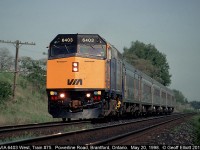 VIA 6403 has train #75 in hand as it speeds by on the Dundas Subdivision toward Paris, Ontario and points west.  6403 graces our new $10.00 bill and has since been renumbered 6459 to protect VIA's image should 6403 have ever been in an accident.  That's Lawyers for you...........