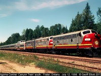 Algoma Central FP9 #1753 leads the southbound Canyon Train on it's return trip to Sault Ste. Marie.  Our NARCOA motorcar trip is holding in the siding as we wait here for the Canyon Train to pass.  Once clear, we'll continue our journey north to Hawk Junction where we'll park our motorcars and spend the night in Wawa.