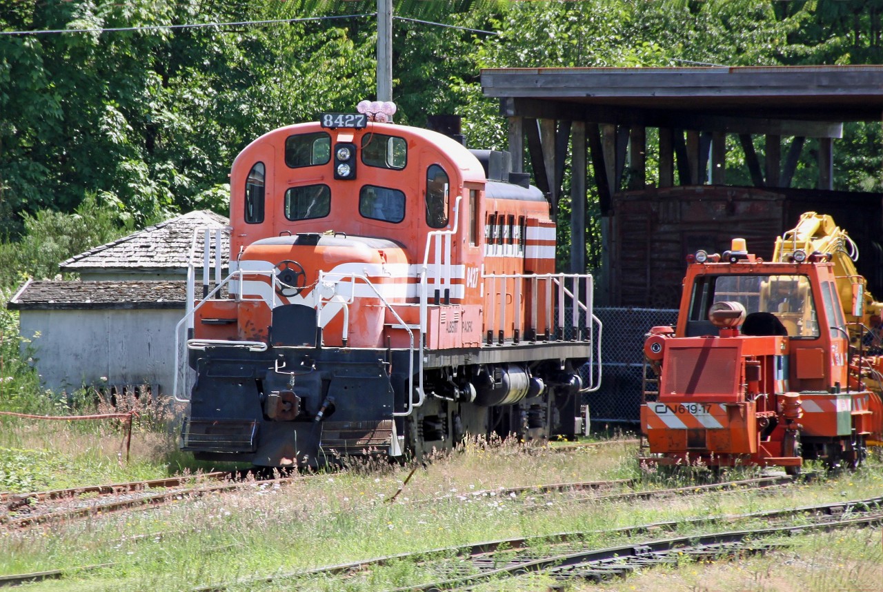 Ex CP RS3 8427 now part of the Alberni Pacific Railway (Western Vancouver Island Industrial Heritage Society) collection seen in the yards from a passing train approaching Port Alberni Station.