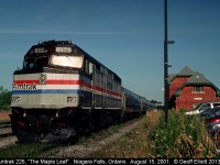 "The Maple Leaf", with Amtrak F40PH #226 in charge, pauses at Niagara Falls station to take on passengers and get cleared by Customs while on it's way to Toronto back in August of 2001.