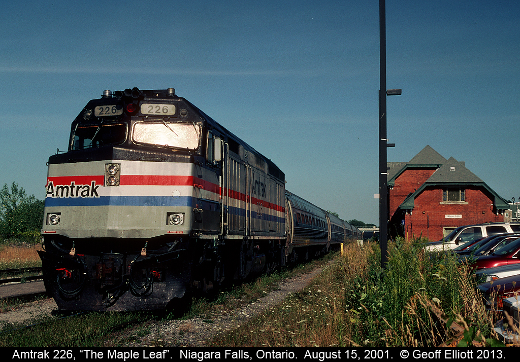 "The Maple Leaf", with Amtrak F40PH #226 in charge, pauses at Niagara Falls station to take on passengers and get cleared by Customs while on it's way to Toronto back in August of 2001.