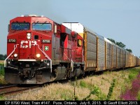 CP 8790 West, Train #147, speeds through Puce, Ontario with it's long train of autoracks.  Trailing unit by the way is an ex-CP, now DM&E, SD40-2, but I didn't get a chance to get the number.