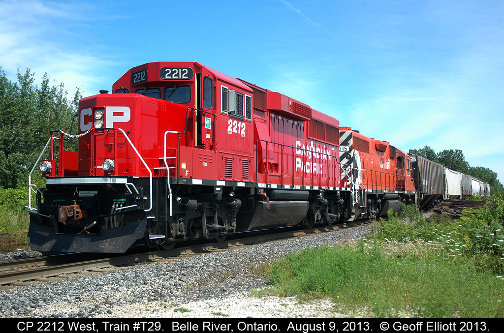 CP GP20C-ECO #2212 heads up train T29 West as it pauses in Belle River, Ontario to wait for an eastbound freight to take the siding before continuing on to Windsor.