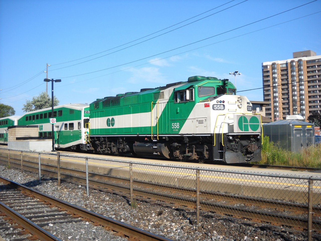 GO F59PH #558 is pushing an eastbound GO train out of Long Branch station on the evening of August 18th 2013.  #558 is operating at the end of the GO train and is being used instead of a cab car.  #558 is one of eight remaining F59PH locomotives on GO Transit's roster.