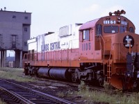 Leased Illinois Central C-636 1105 sits in St Luc Yard near the old coal tower.
