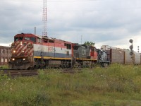 CN 434 rolls into Paris to do some work with BCOL 4625, CN 2648 and CCGX 4015 on a quiet Sunday afternoon in the summer. The trailing unit (CCGX 4015) said "Cando" on it; not sure where this locomotive was destined for.