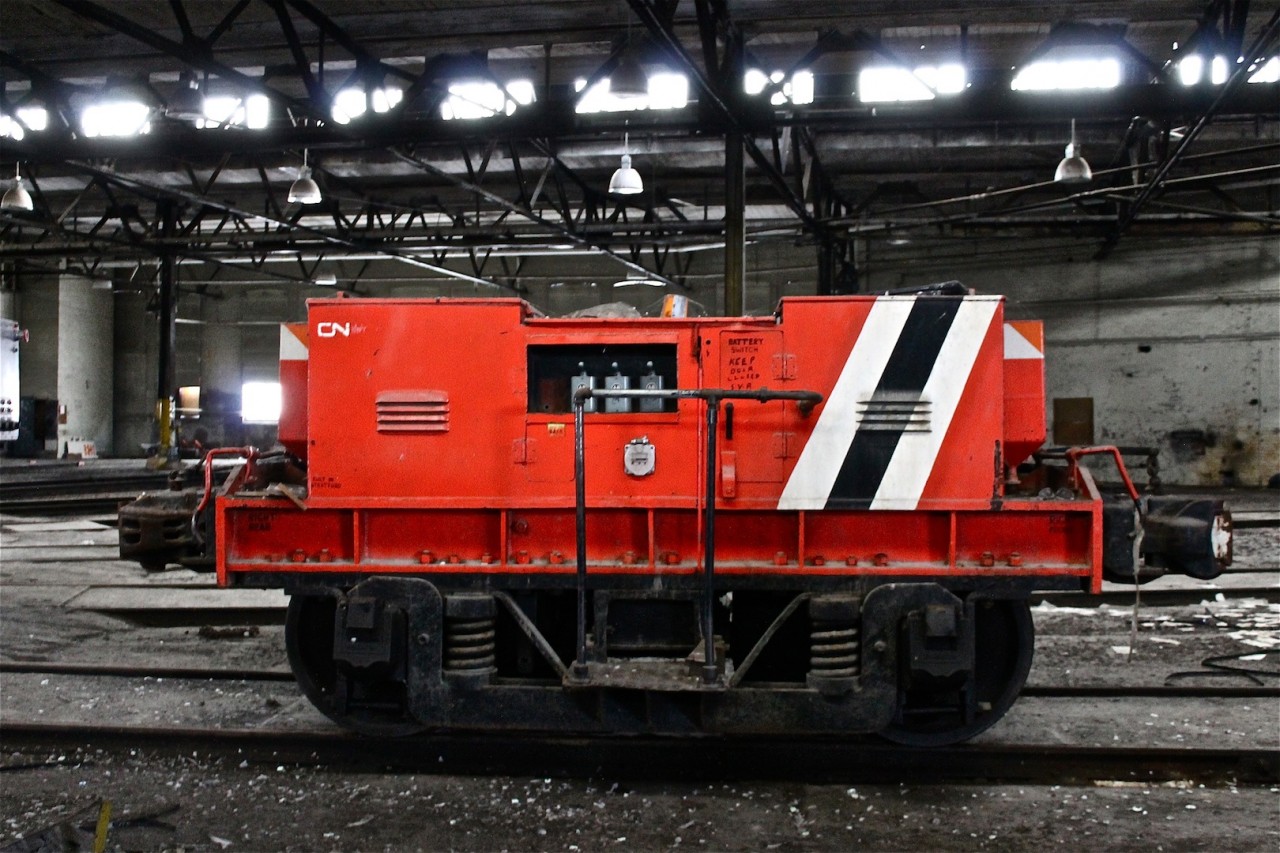 Have you ever seen one of these before? It's a bull unit in the abandoned Hornepayne roundhouse, this little critter was electric and used to move locomotives around the roundhouse without having to start them. This roundhouse has a rare indoor turntable under it's massive roof.

NOTE: This photo was taken on CN property with permission. DO NOT TRESPASS.