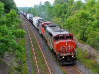 Our only true catch of the day was a good one in my books, CN SD60F 5500 leading a short manifest under Denfield Bridge. It's getting difficult to shoot there now with all of the overgrowth but it was on the way home and quiet so we scooted up the old dirt road to see if anything was coming, shortly after rain was on the way so we were back on the road.