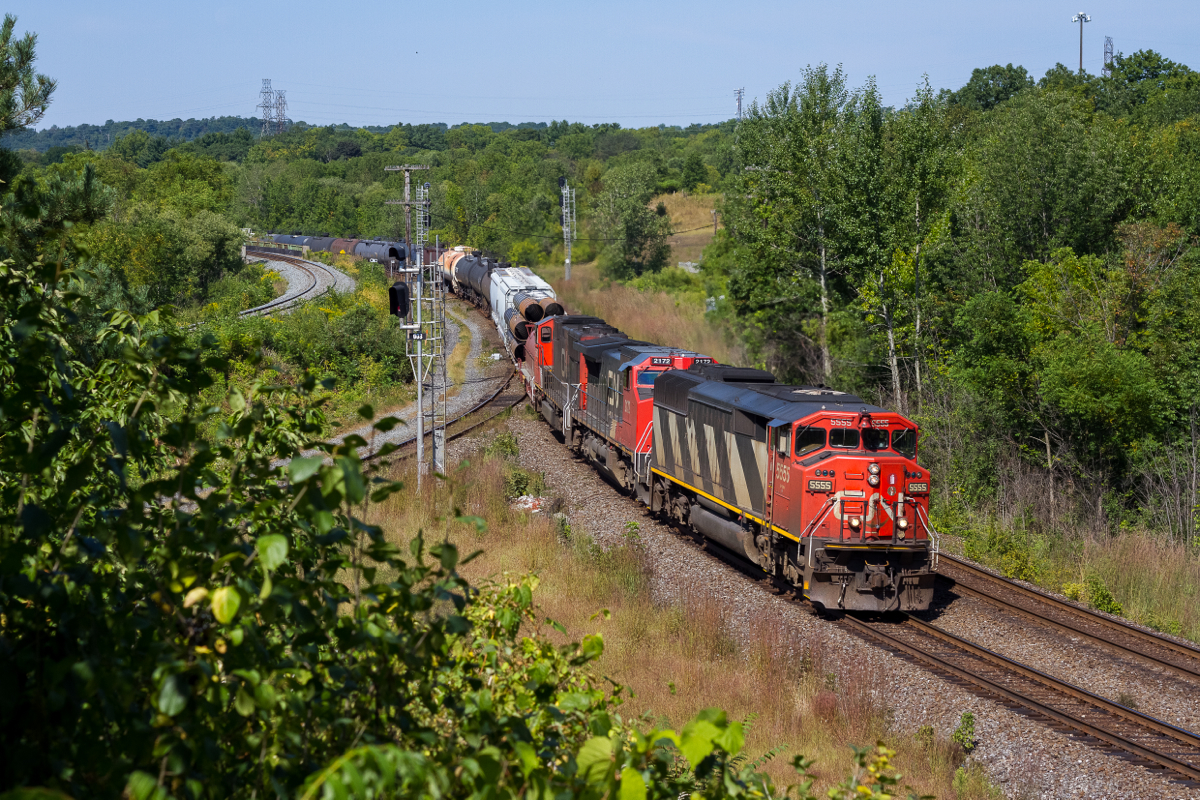 Quadruple 5 eastbound at Hamilton West.  EMD SD60F, # 5555 leads train 382 towards Toronto at Hamilton West with a decent lashup on a wonderful late August morning. Thanks to Brendan, I was able to squeeze in getting a shot of this great train before starting my 12 'o clock shift at Staples up the hill in Waterdown.