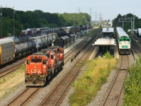 The eastbound run of what my brother and I deduced was a training train, passes through Aldershot station. The 3 GeePs including 4140, 4701 and 4710 went to Bayview to take a spin around the wye. On track 3 GO 558 faces west waiting for GO 563 on the other end to lead eastward.  