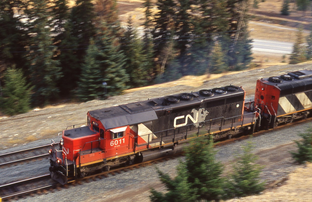 CN SD40u #6011 screams out of Jasper heading east for Edmonton