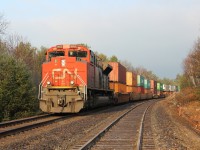 CN 8855 shoves on the rear on a long westbound intermodal train.