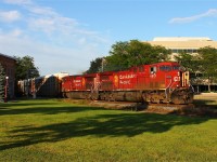 Two CP AC4400CW's whine their way through the heart of Chatham Ontario with a long string of autoracks with clearance to Walkerville.