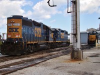 CSX power sits quietly at the 'roundhouse' in Sarnia awaiting their next assignments, meanwhile CSX 2799 was busy switching the yard in the distance behind me. Taken on railway property with permission. 