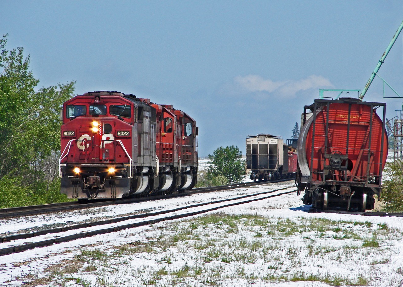 Even in the middle of winter the grain keeps moving.  CP 9022, 5930 and 5910 switching at t he elevators at Niobe, Near Innisfail.