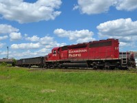 Current CP Windsor Yard engine 5730 shoves a long cut of gondolas back into the yard off of the ETR trackage.