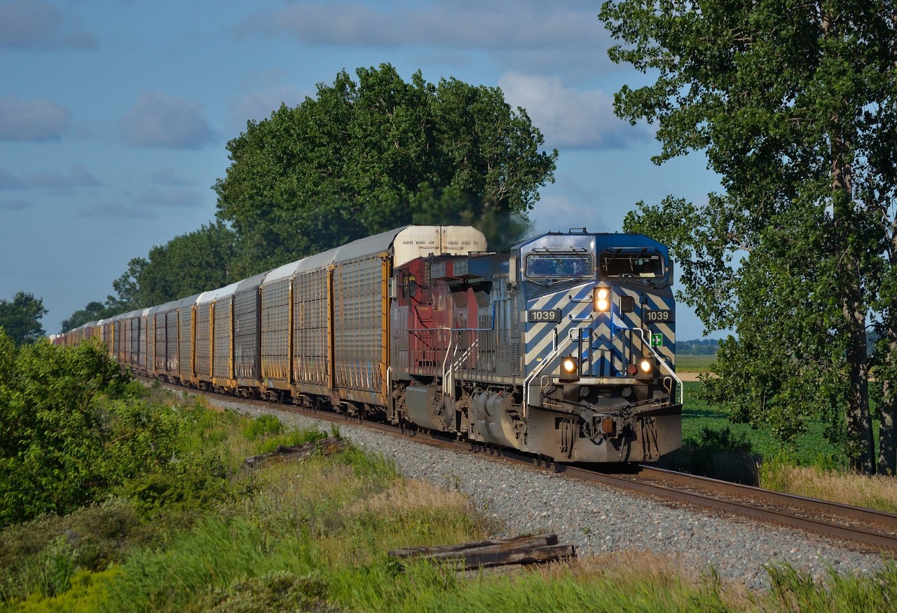 CEFX 1039 leads CP 234 eastbound thru Jeannette mile