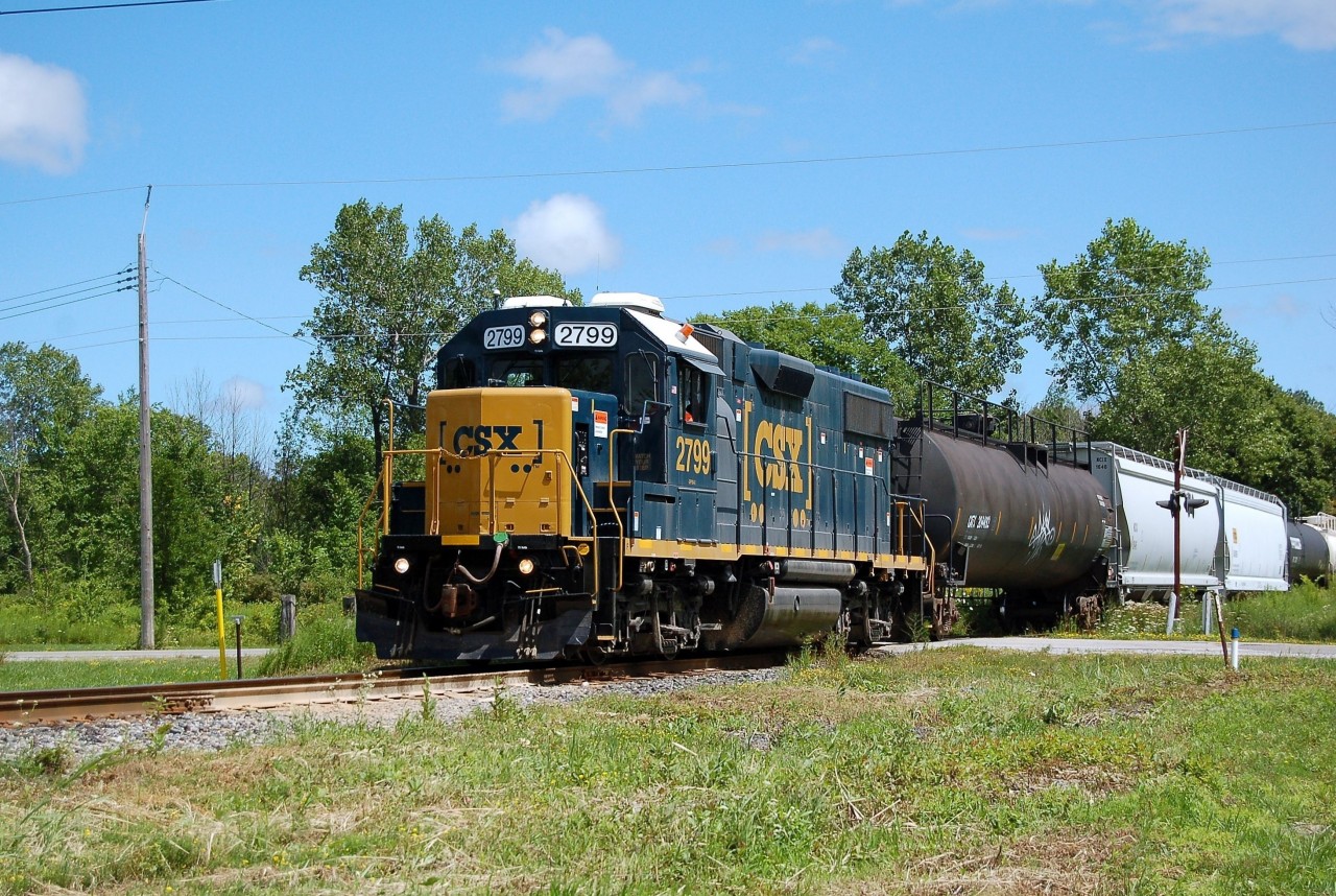 The new face of CSX in Ontario, instead of the ussual "canadian" units we were so used to CSX now has two former Conrail units 2799 and 2757 on the property both with remote control. 2799 was running back to home rails with the daily transfer seen here on the CN spur line.