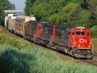 CN 332 begins the 9 mile descent to Bayview as it rounds the curve at Copetown with CN 5419, CN 5400 and IC 1028.