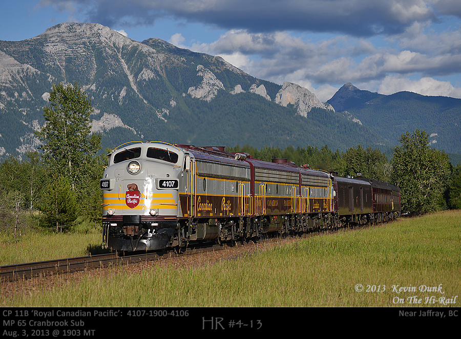With glorious skies above and the Canadian Rockies as a backdrop, CP's Royal Canadian Pacific with F units 4107-1900-4106 are about to pass the MP 65 marker on CP's Cranbrook Subdivision as they make their way to Cranbrook BC for their overnight stay before continuing on to Golden the following day.