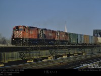 Train CP 505 is seen busting loose with 3 big M-Liners CP 4702-4558-4568 as it crosses the bridge westbound at Ste-Anne-de-Bellevue, Quebec. 