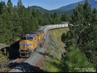 UP5538 and 5530 descending the grade eastward from Cranbrook to Ft Steele with empty potash traffic in beautiful evening light.