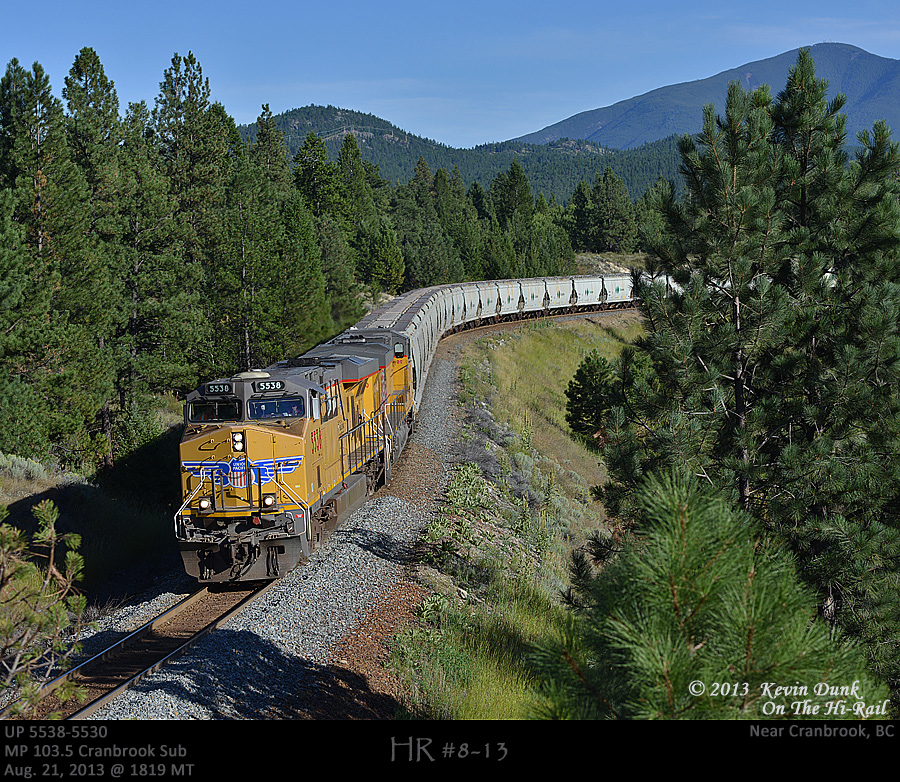 UP5538 and 5530 descending the grade eastward from Cranbrook to Ft Steele with empty potash traffic in beautiful evening light.