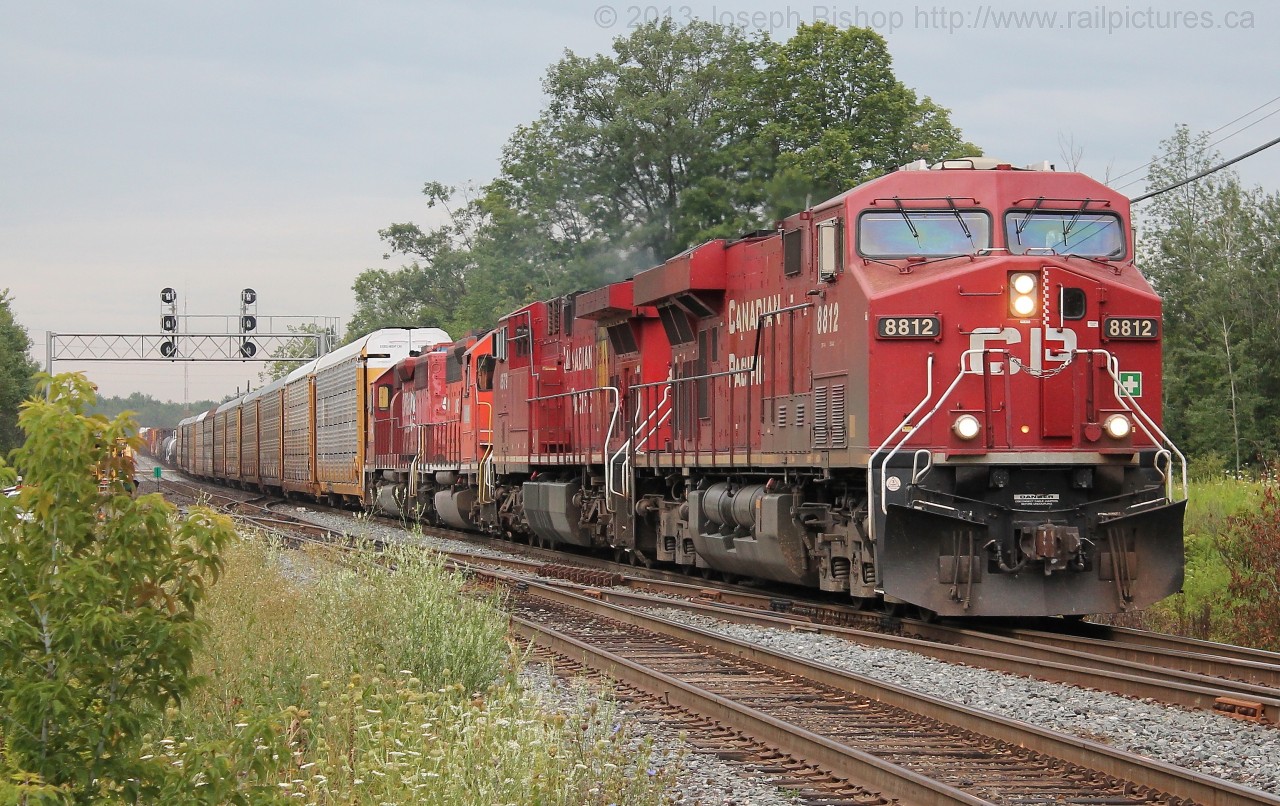 CP 8812 leads a freight through Campbelleville Ontario with an AC4400 and two SD40-2's trailing.  One SD40-2 was an ex CP now DME unit.  My 130th shot on RP.ca
