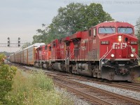 CP 8812 leads a freight through Campbelleville Ontario with an AC4400 and two SD40-2's trailing.  One SD40-2 was an ex CP now DME unit. <br> My 130th shot on RP.ca