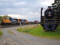 ONR 113 has entered the yard at Englehart with ONT 2103 and ONT 2101.  TNO 701 sits on a piece of track alongside the yard.