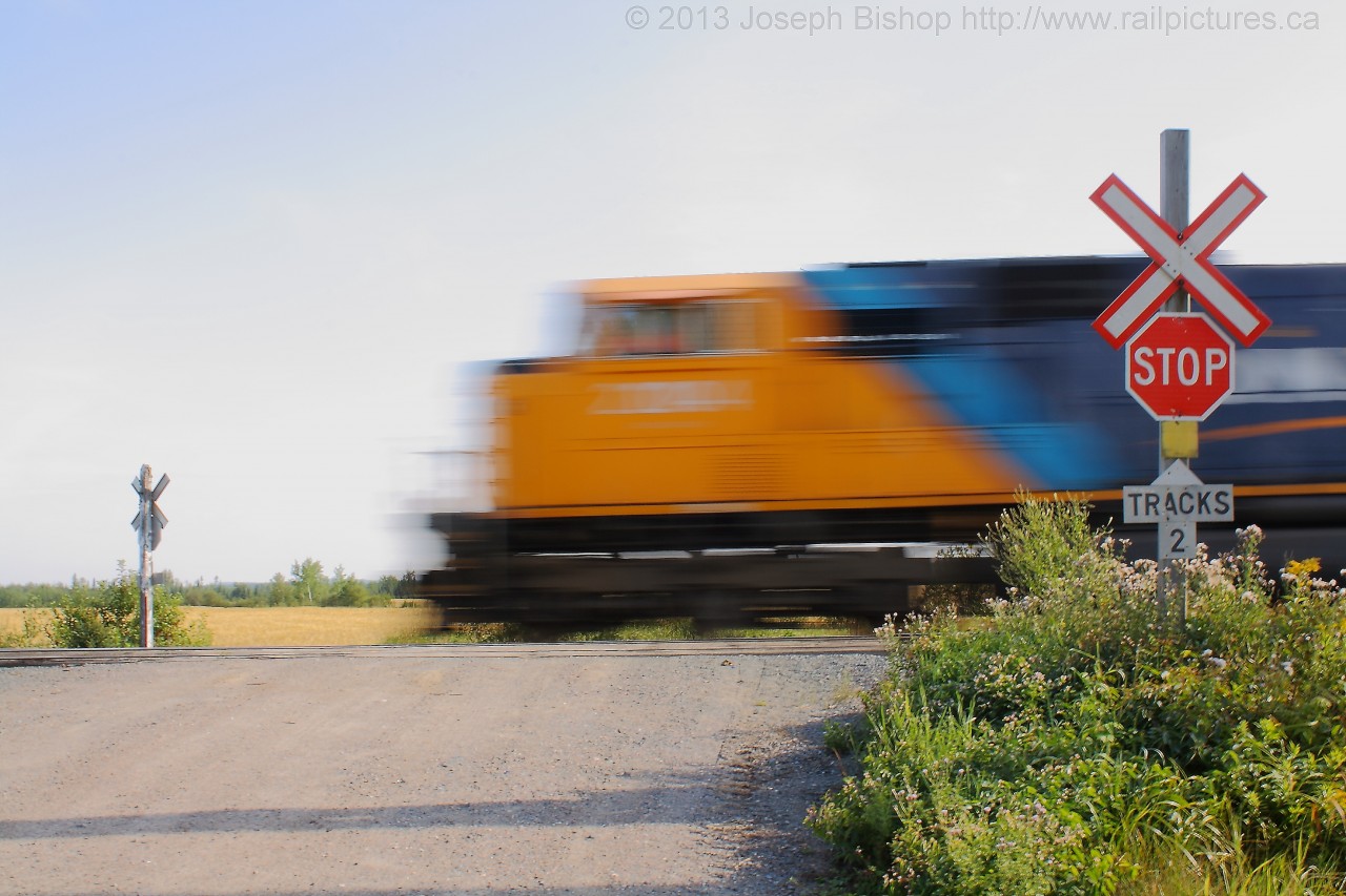 ONT 2104 gets train 207 under way out of the North end of Englehart yard.  Shutter Speed:1/5 sec FStop: 22 ISO: 100