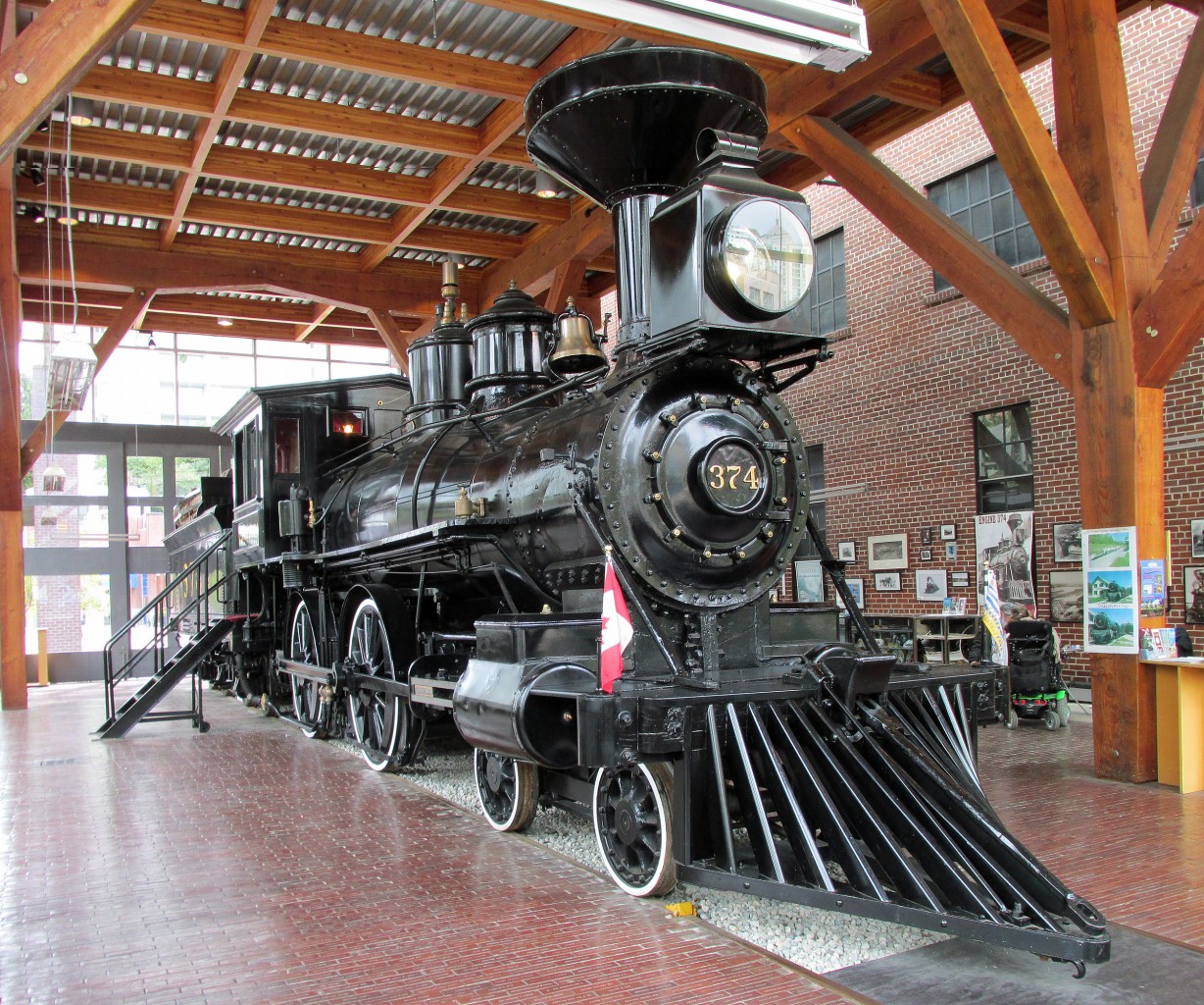 1886 built 4-4-0 CP 374 was the steam engine which pulled the first transcontinental train to arrive in Vancouver, arriving on May 23, 1887. This was a year after its sister Engine CP 371 brought the first Canadian Pacific Railway train to cross Canada into Port Moody. 
# 374 was put on display on the turntable at the renovated CPR Drake Street roundhouse during Expo 86.