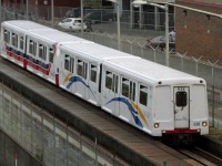 Translink "Skytrain" (Vancouver) MkI UTDC 4 car set with #038 leading.  Built in 1984-85 these were the original train sets for the "Expo" line opened in time for Expo '86 running between Waterfront and New Westminster.