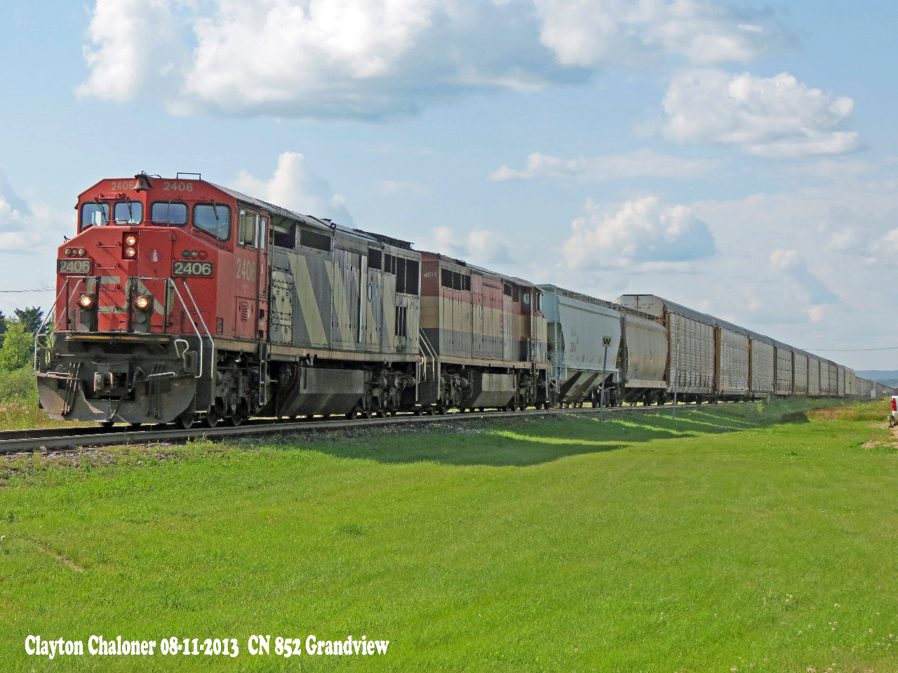 CN 852 at Grandview CN 2406, BCOL 4617 with 73 cars.