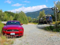 The Whistler Sea To Sky climb Rocky Mountaineer heads south on the Canadian National Squamish subdivision near Whistler. Thanks goes to the crew for the huge friendly wave!
