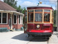 Vintage TTC streetcar 2894 sits infront of the relocated Rockwood CNR station at the Halton Radial Railroad museum awaiting its next trip.