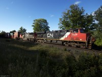 CN Q102 powers through Dock Siding, beside Lake Joseph.

(I from Toronto and I uploaded a photo, does that make me good yet?)