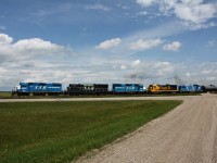 SSR newer power leads a mixed consist towards Regina with 85 loaded oil tankers. Where in North America can you find a GP38-2 b23-7 and a GP15D consist. 