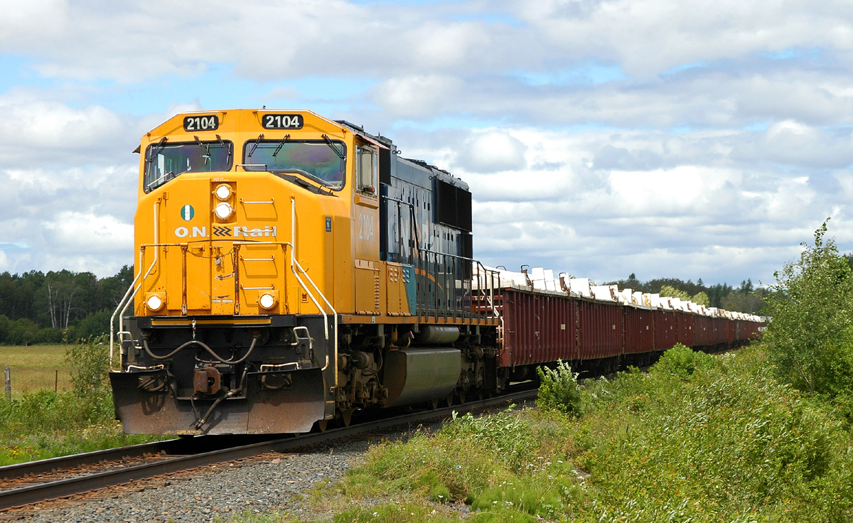 ONT 2104 leading 308 just outside of the Englehart Yard
