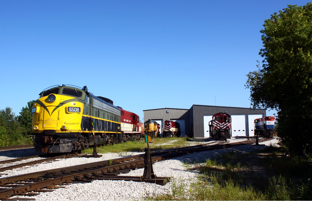 In my opinion, easily the coolest shortline in Ontario, OSR's roster is something of an operating museum. Behind their Salford shop, eight locomotives of eight different models can be found awaiting the call of duty. The 6508 and 383 would be called shortly for the Ingersoll-Woodstock turn, while the others get to enjoy the day off. Where else can you find a railroad operating with engines from four different builders? Note: taken on RR property with permission.