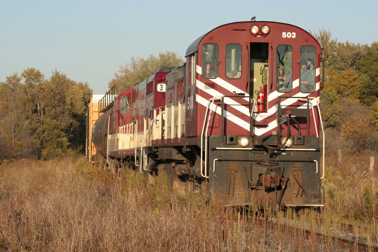 Found some interesting OSR shots in my collection. I know this is in Mossley, Ontario but I don't recall the Subdivision name nor the road that this train is approaching. Someone can fill me in and provide a comment. I just got off this train after taking a ride from Beachville. I believe they are continuing their journey to Ingersoll. Friendly crew!