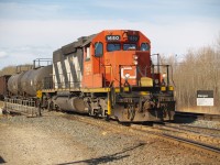 CN549 returning from Procor with sulfuric acid and sulfur loads.  SD38 in the lead