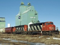 It's a long way north, the winters are long and summer short but the grain still grows.  SD40-2's CN 5312 and 5310 prepare to leave Grimshaw with a grain train on a sunny but cold march morning.